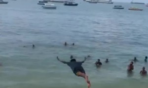 Guy's Leap into Water Falls Short