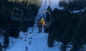 Struggling Snowboarder Knocks Line of People Down