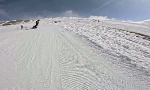 Snowboarder Wipes Out Skiers