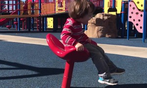 Spinning Toddler Takes A Tumble