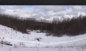 Snowmobiler Full Sends It Over Hill