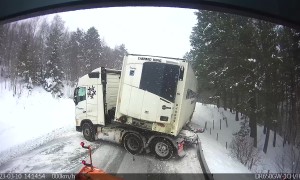 Semi Truck Loses Control On Icy Hill