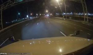 Man Runs Across Busy Highway Causing Truck To Swerve