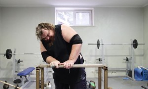 Karate Chopping A Board With Nails