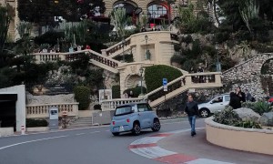 AMI Car Takes Corner Too Fast and Falls on It's Side