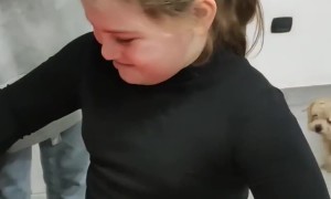 Daughter Surprised by Kitten is Overcome with Joy