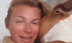 Pup shares warm & fuzzy morning hugs with owner