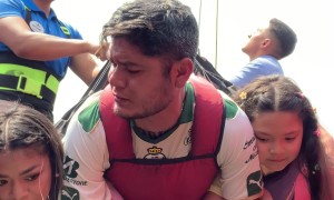 Family Rides the Sky Coaster at Amusement Park in Mexico