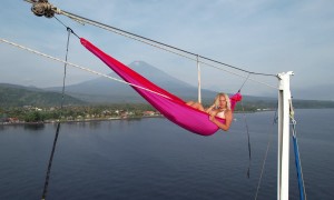 Extreme Hammocking Atop Sailboat