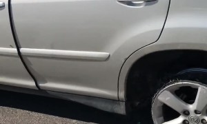 Driver Doesn't Seem to Realize How Damaged His Car Is After Apparent Crash