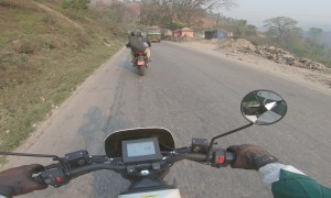 A Bus Brushes Motorcyclist