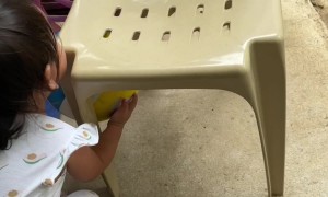 Toddler Struggles to Retrieve Ball