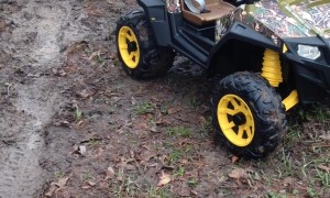 Brother Tows His Sister Out Of The Mud