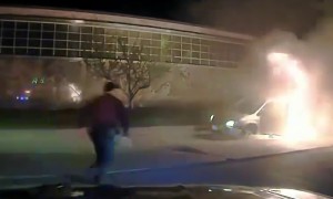 Police rescue man after vehicle catches fire