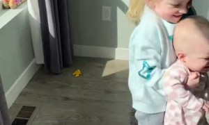 Big sister hilariously struggles to keep pace with twin siblings