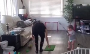 Supermom snags golf ball midair after toddler's living room swing