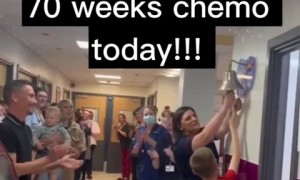  Young boy victoriously rings bell after 70 weeks of chemo