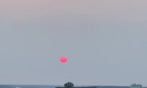 Video captures mesmerizing pink sunrise due to wildfire smoke