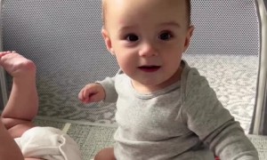 Little baby's delightful laughter erupts from his own sneezes
