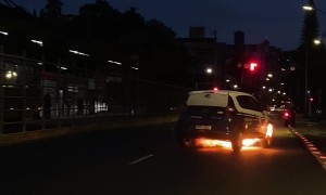 Flaming Car Pulls Over