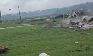 Tornado Winds Destroy Roofs and Scatter Debris