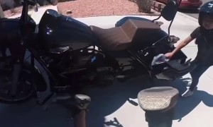 Daughter Accidently Causes Dad to Fall Off Motorcycle