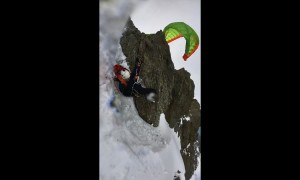 Paraglider Catches On Rock