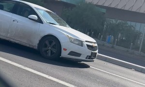 Intersection Altercation Ends With Damaged Car Door