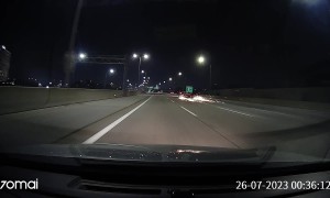 Sign Slips From Truckbed