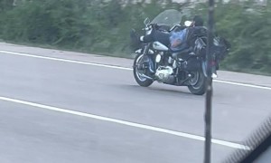 Motorcycle Rider Reclines Comfortably on the Highway