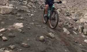 Mountain Biker Falls Down Rocky Slope