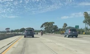 Motorcycle Fails To Wheelie On Freeway