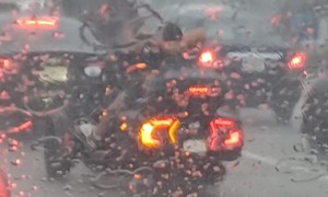 Biker In The Rain
