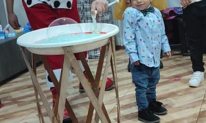 Partygoer Covered In Bubbles