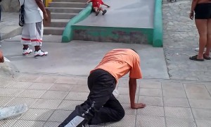Boy on Slide Accidently Crashes Into Lady