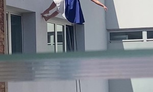 Woman Dances On Wall Side