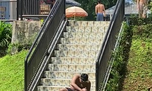 Swimmer Slips On Stairs