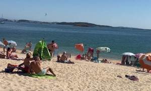 Mini-Tornado Takes Towels and Umbrellas