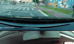 Passing Biker Breaks Mirror