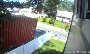 Shipping Container Squishes Car