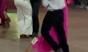 Girl Trips and Falls on Dance Floor