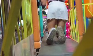 Carnival Ride Hilariously Traps Woman On Moving Walkway