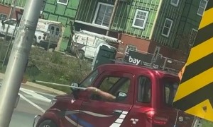 Tiny Car Crosses The Street