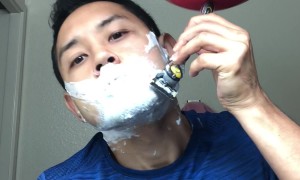 Man Shaves While Balancing Basketball on Razor