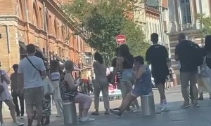 Pedestrians Picnic On Lowerable Barriers
