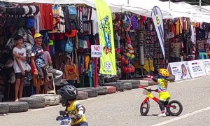 Boy in Bike Race Gets Distracted