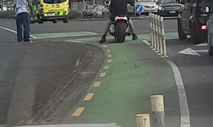 Biker Gets His Helmet Cleaned