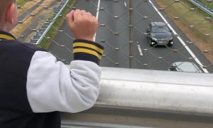 Boy Waves to Truckers