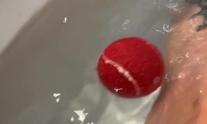 Golden Retriever Wants to Play Ball While Mom Takes a Bath