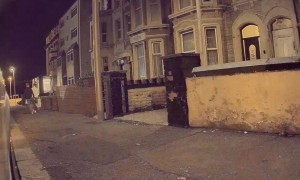 Man Runs Across Car's Roof